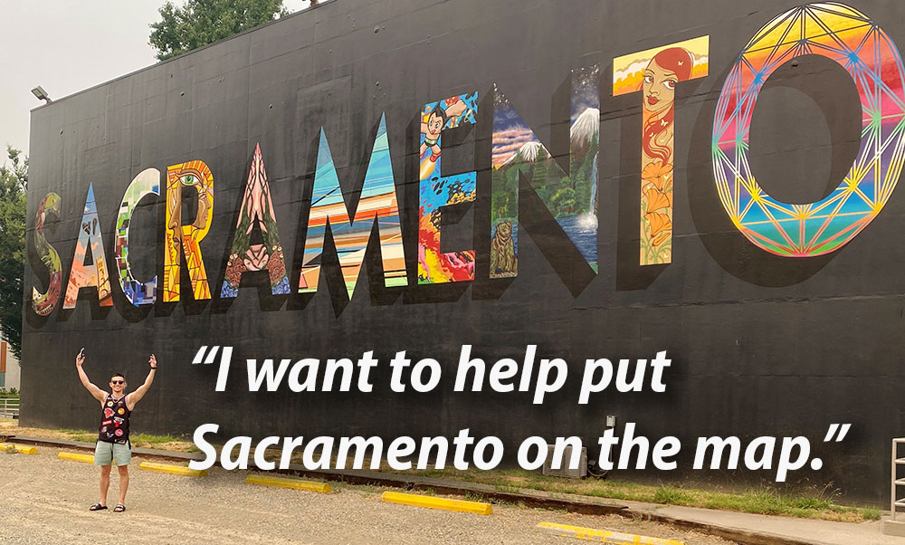 Rodriguez in front of the "Sacramento" mural with quote, "I want to help put Sacramento on the map"