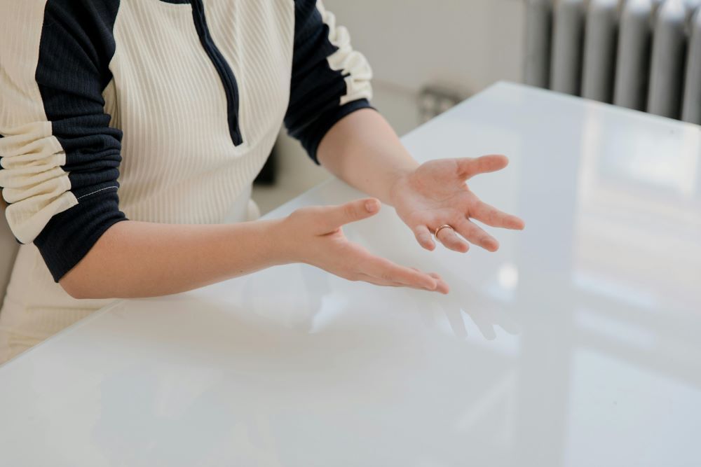 person communicating with hands