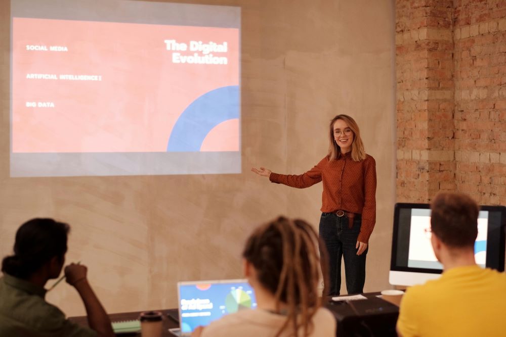 person presenting in front of an audience