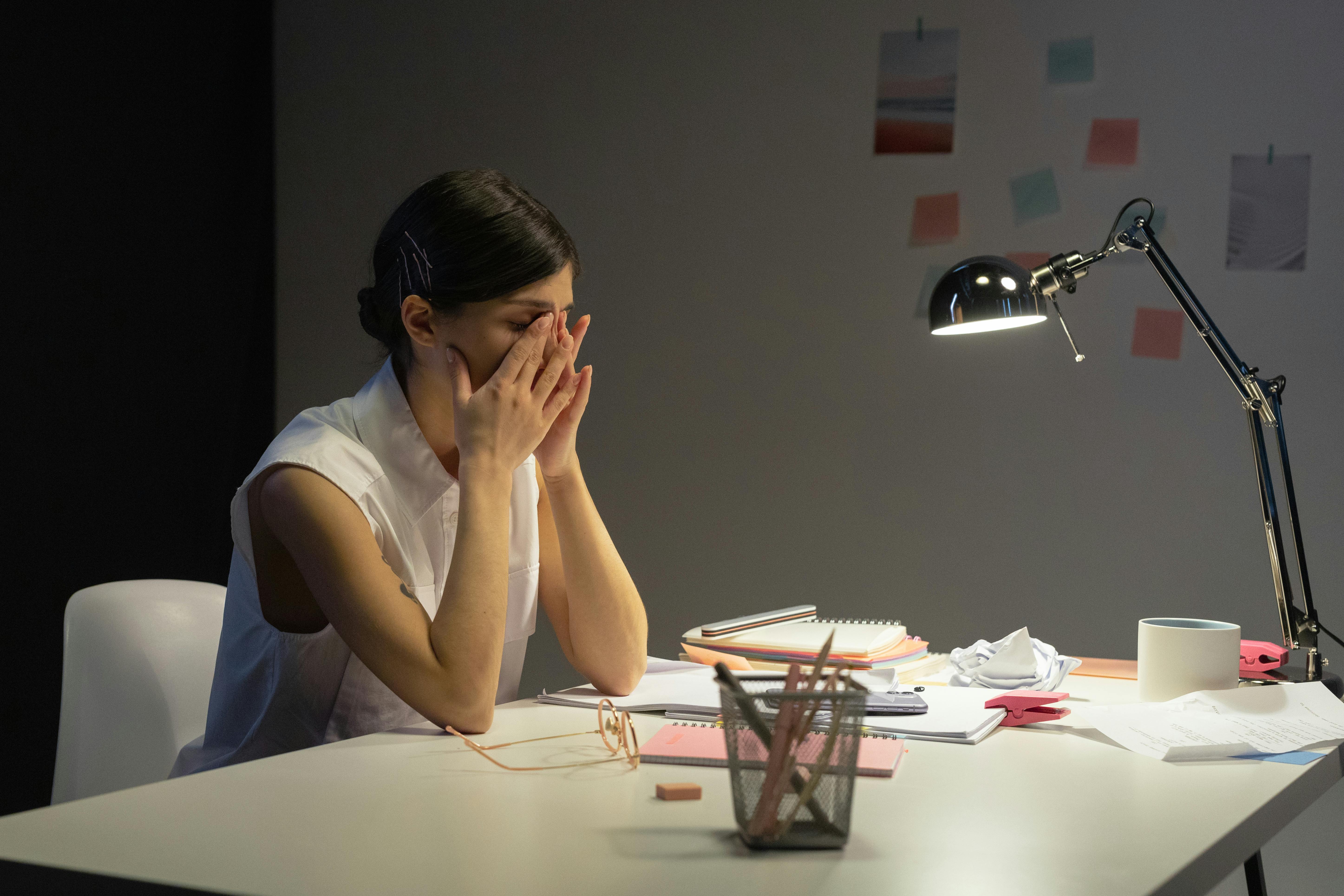 person frustrated at desk