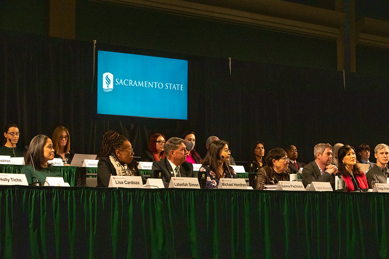 Presidential search committee at the head of the Union Ballroom