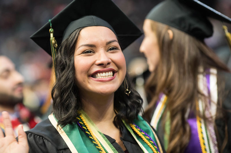 Smiling student in grad cap