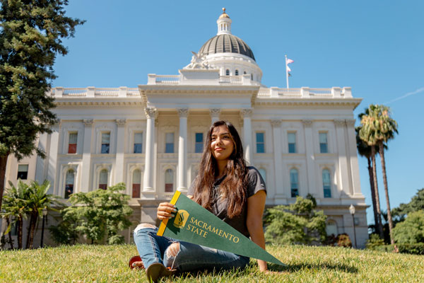 Student in front of Capitol Building