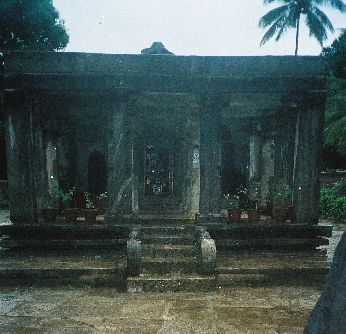 old jain temple behind watchmaker's shop