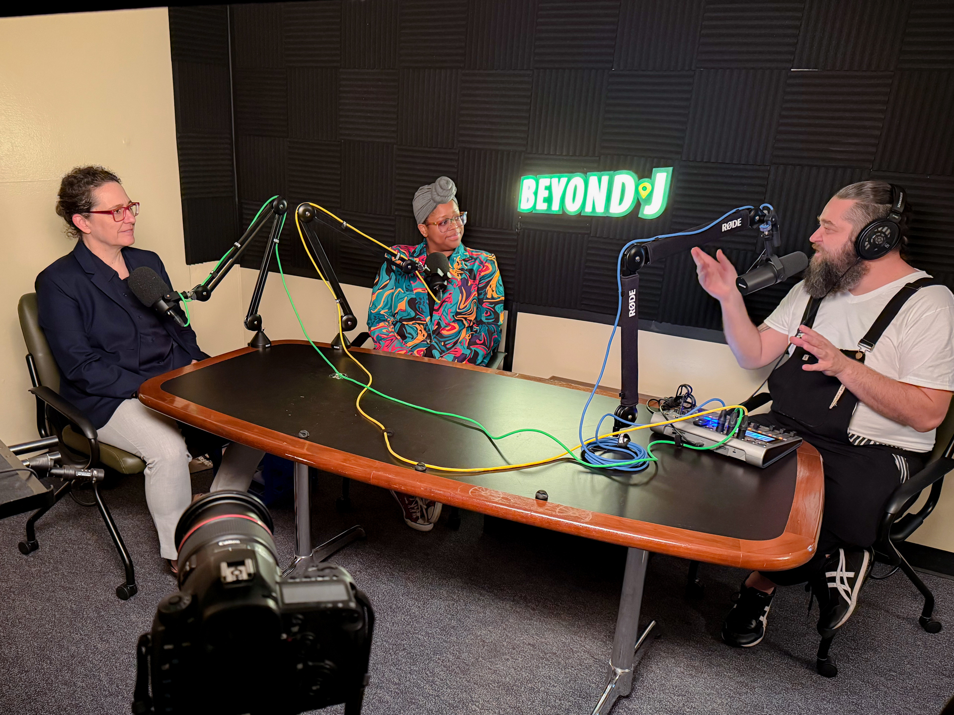 Kim Nalder, Rebekkah Mulholland and Phillip Altstatt, sitting in studio during a recording of Beyond J.