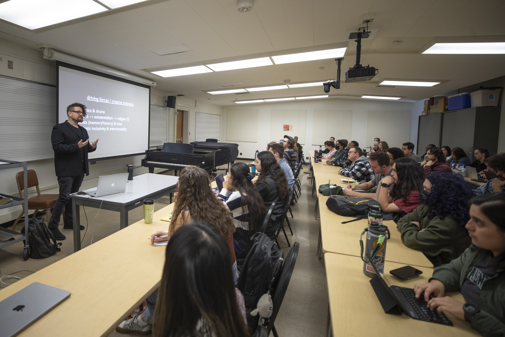 Composer David T. Little speaking to a classroom full of Sacramento State students during FeNAM 2024.