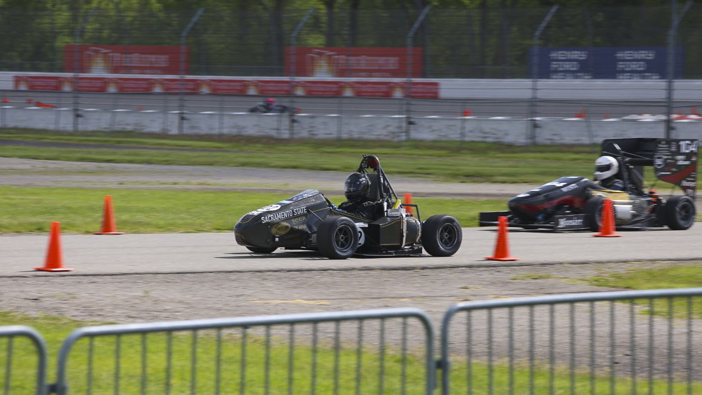 A race car on a track during a competition.
